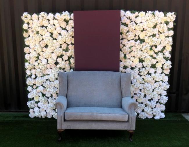 silk-flower-wall-with-panel-&amp-couch